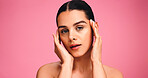 Skincare, health and portrait of woman in studio with natural, cosmetics or facial glow. Serious, confident and female person from Brazil with face dermatology for wellness by pink background.