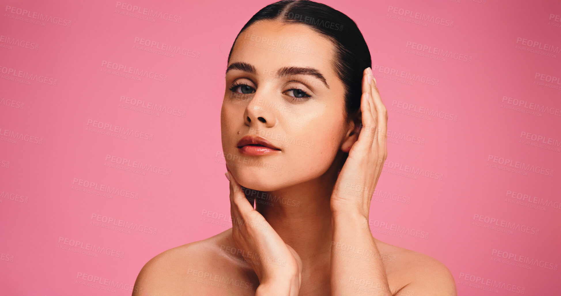 Buy stock photo Skincare, cosmetics and portrait of woman in studio with natural, beauty or facial glow. Serious, mockup space and female person from Brazil with face dermatology for wellness by pink background.