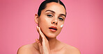 Beauty, face cream and portrait of woman in studio with natural, cosmetics or facial glow. Moisturizer, skincare and female person from Brazil with face dermatology for wellness by pink background