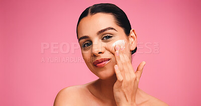 Buy stock photo Skincare, happy and portrait of woman with face cream in studio with natural, cosmetics or facial glow. Moisturizer, mockup space and person from Brazil with dermatology for health by pink background