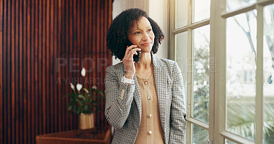 Buy stock photo Woman, phone call and smile by window at office for networking, listen and contact at media company. Person, happy and smartphone with reflection, thinking and decision for deal at creative agency