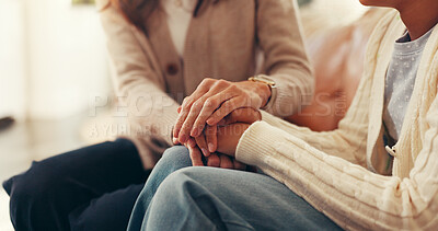 Buy stock photo Holding hands, home and mom with child on sofa for love, emotional support and bonding together. Family, care and mother with girl in living room for empathy, connection and security in relationship