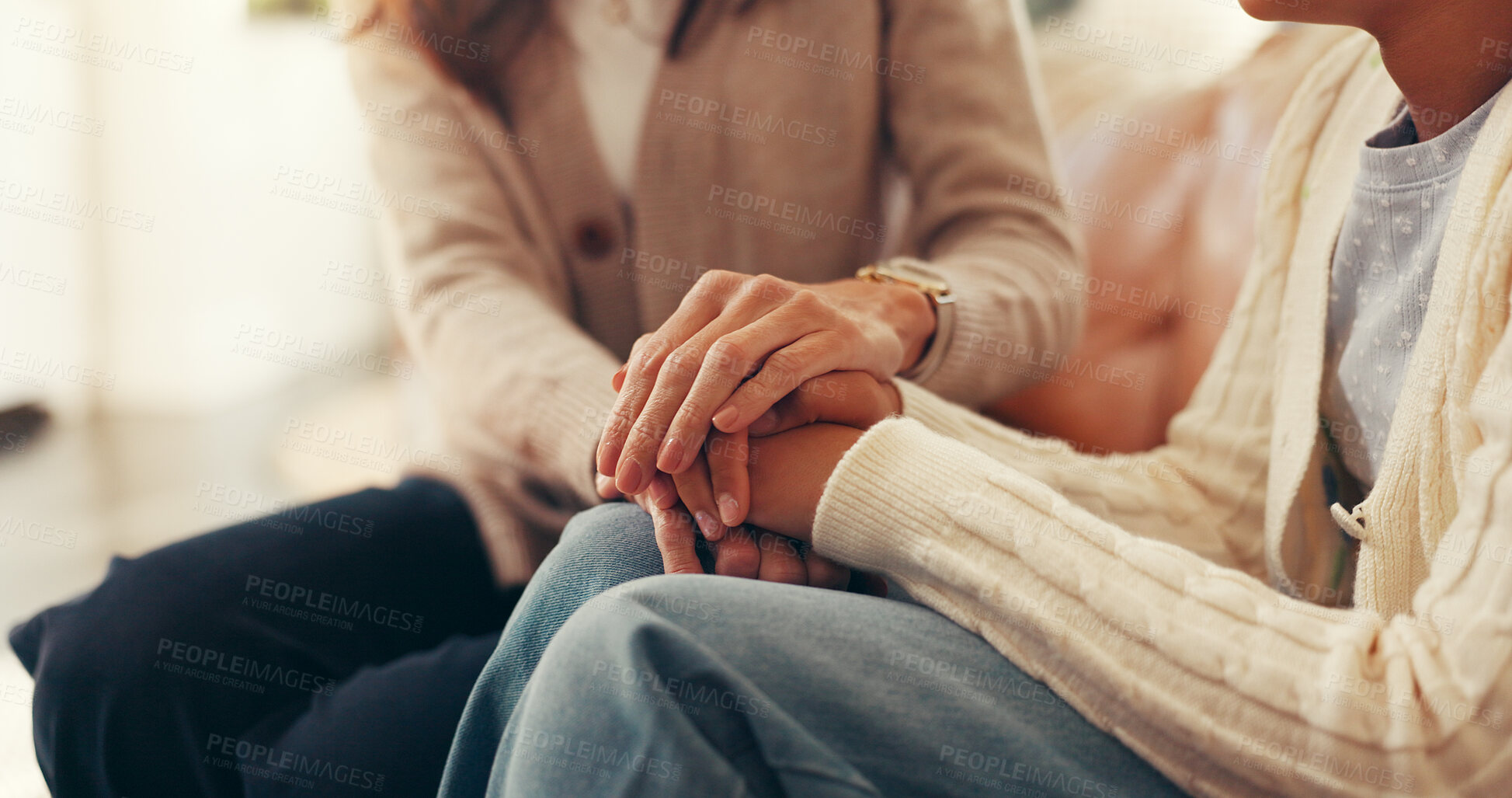 Buy stock photo Holding hands, home and mom with child on sofa for love, emotional support and bonding together. Family, care and mother with girl in living room for empathy, connection and security in relationship