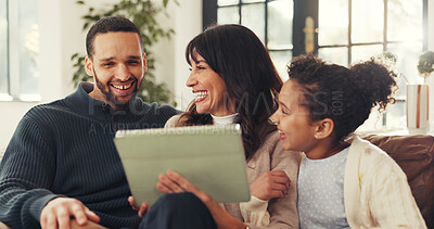 Buy stock photo Parents, girl and laugh with tablet on sofa, smile or love with funny film, bonding and streaming in lounge. Father, mother and daughter with joke, app and movies on couch at interracial family house