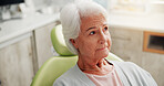 Checkup, oral hygiene or senior woman in clinic with toothache, thinking or worry in consultation. Healthcare, patient or nervous in dentist office with thoughts, cosmetic or treatment in retirement.