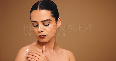 Buy stock photo Woman, skincare and lotion with beauty in studio, mockup space or application on background. Girl, model and moisturizer cream for benefits, dermatology or sunscreen with cosmetics for UV protection