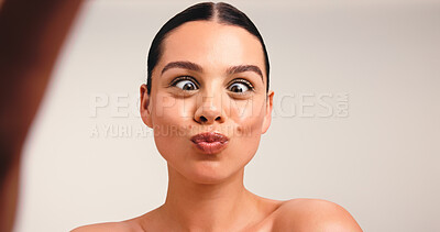 Buy stock photo Portrait, funny or influencer in studio with selfie, skincare and cosmetic for social media. Meme, content creation or woman in fashion with makeup, online or wellness in space for advertising.
