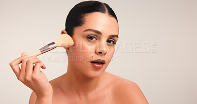 Buy stock photo Woman, makeup brush and portrait with beauty in studio, powder and application with pride on white background. Girl, cosmetic tools and foundation with skin, confidence and mock up space in Australia
