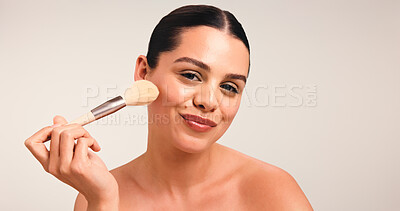 Buy stock photo Makeup, brush and portrait of woman in studio for blush application, beauty or self care. Cosmetics, powder and foundation tool with female person on white background for aesthetic, contour and space