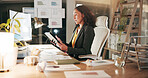 Online, employee and woman with tablet in office, document or financial analysis on website at night. Serious, accountant and person with computer for investment opportunity, graphs and working late