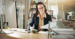 Business, documents and reading with financial woman in office at night for review of information. Computer, finance and paperwork with corporate employee in workplace for evening administration