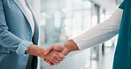 Business people, nurse or meeting with handshake for deal, agreement or medical funding in hospital. Closeup, healthcare worker or employee shaking hands for partnership, b2b or health plan in clinic