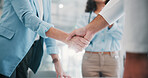 Business, deal and people shaking hands in office for b2b agreement, finance partnership or welcome. Financial team, investor and handshake at firm for stakeholder approval, company merger and offer