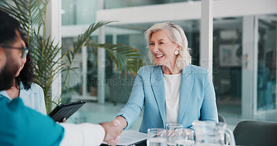 Buy stock photo Handshake, doctor and woman in hospital, meeting and welcome with introduction, smile and hello. Mature person, healthcare and happy employees in workplace, shaking hands and thank you with greeting
