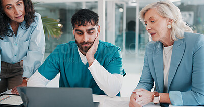 Buy stock photo Woman, team and meeting at hospital with laptop for review, insight and solution at healthcare job. Mature person, clinic director and doctor with planning, computer or medical research in boardroom