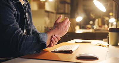 Buy stock photo Business person, hands and night with wrist pain for muscle tension, pressure or strain in office. Journalist, employee or working late on keyboard for carpal tunnel syndrome or joint inflammation