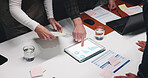 Business people, hands and meeting with tablet for statistics, analytics or progress in office. Top view, group or employees pointing with technology display, graph or chart for performance review