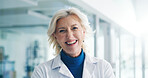 Happy, mature woman and portrait of doctor in hospital with confidence for medical support career. Smile, professional and female healthcare worker from London with pride for cardiology in clinic.