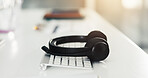 Call center, keyboard and interior with headset in empty office for virtual assistance, crm and help desk. Communication, contact us and hotline support with headphones in agency for lead generation