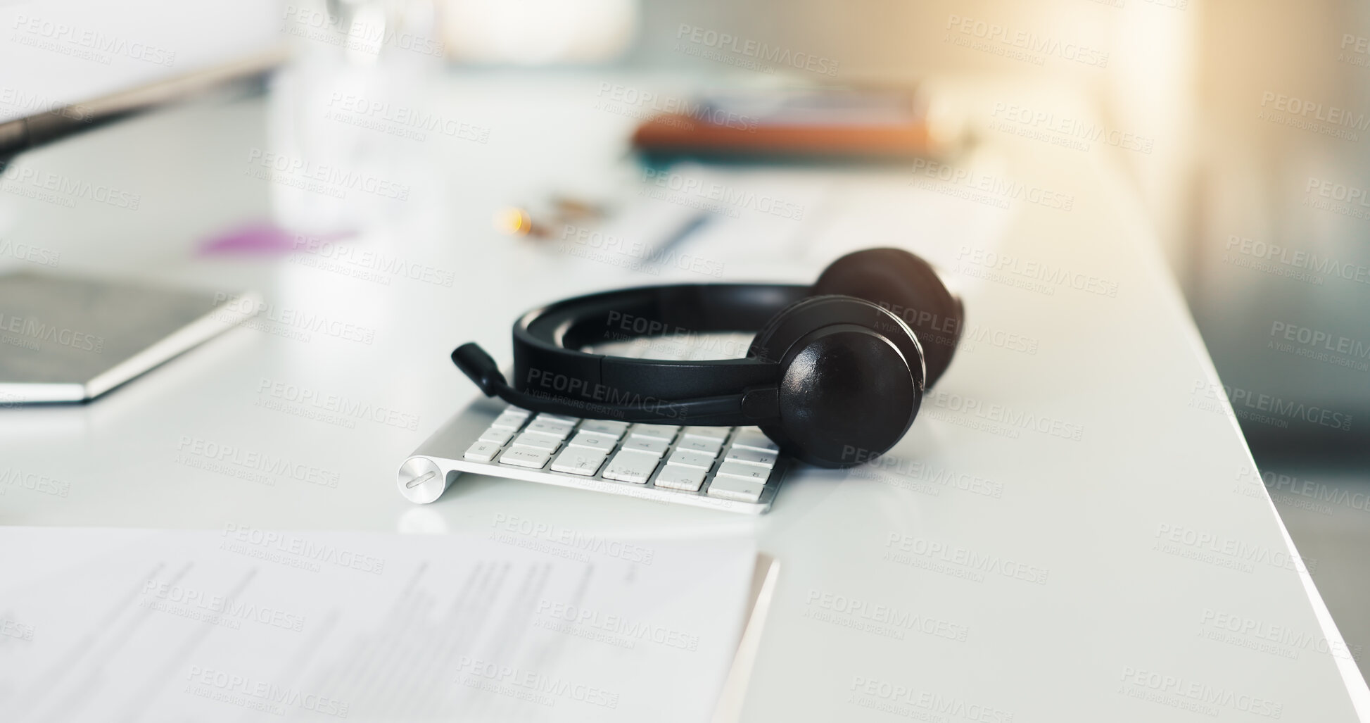 Buy stock photo Call center, keyboard and business with headset in empty office for virtual assistance, crm and help desk. Communication, contact us and hotline support with headphones in agency for lead generation