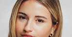 Portrait, woman and eyes with skincare in studio for beauty, fluffy eyebrows and natural makeup. Female person, cosmetics and facial shine from dermatology, treatment results and white background