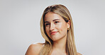 Beauty, thinking and woman in studio with skincare, natural cosmetic and makeup for aesthetic. Confident, smile and female person with space, wellness and dermatology benefits on white background.