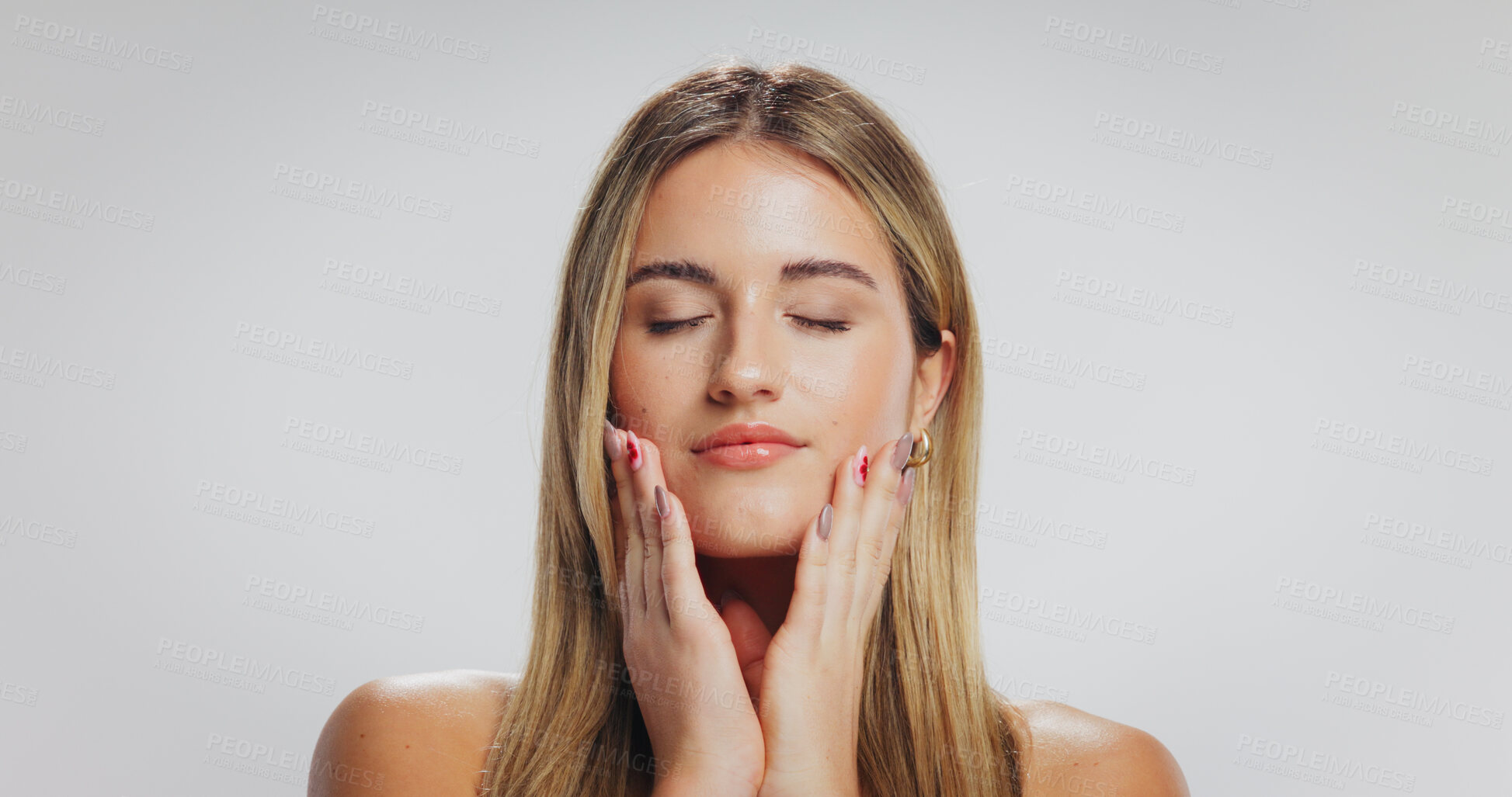 Buy stock photo Beauty, woman and touch face in studio for acne treatment results, healthy glow or self care. Mockup space, person and natural makeup on white background with dermatology, skin wellness or anti aging