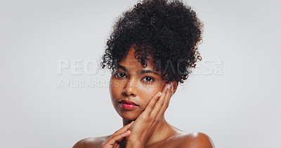 Buy stock photo Hands, skincare and portrait of black woman in studio for dermatology, wellness and skin glow. Mockup, space and face of person with natural hair for cosmetics, grooming or beauty on white background