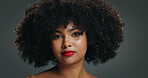 Portrait, afro or woman in studio with makeup, natural hair or coil maintenance for beauty routine. Cosmetics, self care or African person with skincare, volume treatment or shine on black background