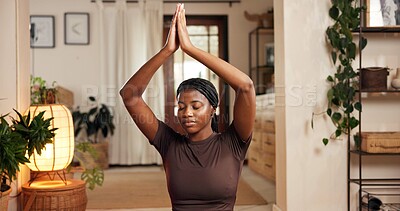 Buy stock photo Black woman, yoga and namaste hands in living room for mind body connection, meditation and relax. Mental clarity, posture benefits and person in home for spiritual practice, zen and morning routine.