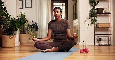 Buy stock photo Meditation, mudra and yoga with black woman on floor in home for awareness, balance or zen. Aura, inner peace and relax with African person in apartment for mental health exercise or mindfulness