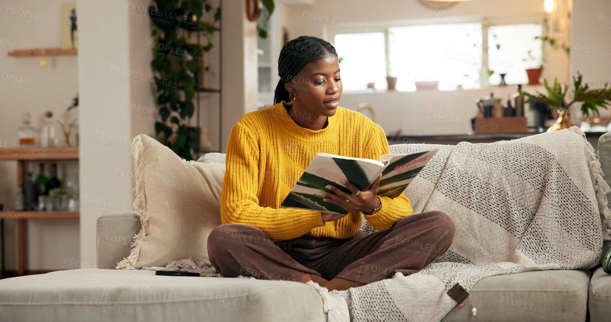 Buy stock photo Relax, black woman and reading a book in home for story, knowledge and literature study. University student, reader and best seller fantasy novel on sofa for learning, fiction hobby and weekend break