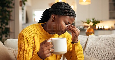 Buy stock photo Black woman, headache and mug with stress on sofa for mental health, pressure or eye strain in home. Tired, female person or migraine with pain, cup or fatigue for mistake, fail or fever in house