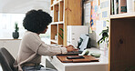 Home office, laptop and woman entrepreneur typing online for creative job, blog post or editing. Freelance work, technology and african person with connection for proofreading, writing or search