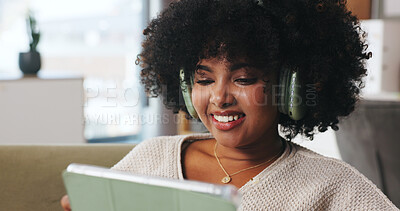 Buy stock photo Smile, black woman and headphones with tablet at house for streaming, social media and listening to music. Happy, female person and digital for movie search, film audio and playlist sound in lounge