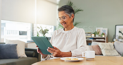 Buy stock photo Home, tablet and woman with smile, internet and digital app for morning news, coffee and network. Happy, tech and mature person in lounge, social media and connection with online reading and chatting