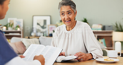 Buy stock photo Conversation, senior woman or bible study in home, scripture reading or guidance for new Christian. Teaching, faith lesson or worship leader in house, spiritual bonding or prayer for understanding 