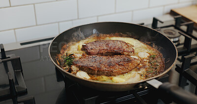 Buy stock photo Pan, cooking and steak at restaurant in empty kitchen for gourmet meal, cuisine and process for food. Equipment, stove and meat with sauce, culinary and catering services with interior at diner