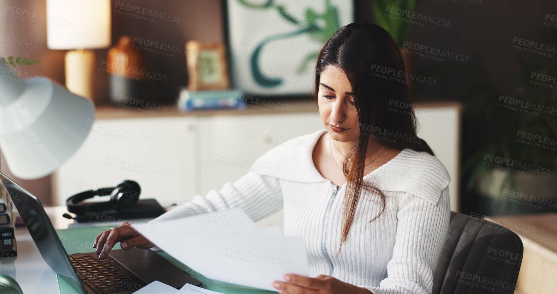 Buy stock photo Woman, laptop and reading document at house for compliance, customer service and script. Agent, remote work and paperwork with pc for reference, account information and procedure manual for crm faq