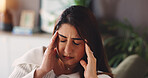 Home, fatigue and woman with headache, burnout and anxiety in living room. House, tired person and girl with migraine, tension and brain fog with pressure or stress in lounge frustrated or annoyed