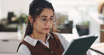 Buy stock photo Tablet, glasses and businesswoman in home with research for freelance creative project. Digital technology, reading and female copywriter with remote work for article publishing in apartment.