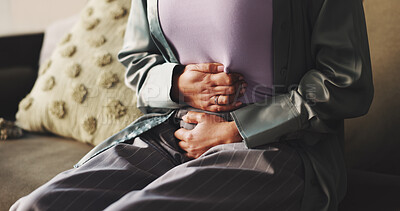 Buy stock photo Cramps, hands and woman with stomach pain on sofa from menstrual cycle, PMS and abdomen bloating. Period, discomfort and person with tummy ache in home with gastrointestinal issue and uncomfortable