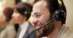 Man, happy and headset at call center with talk, insight or customer support at investment agency. Person, broker and agent with smile, mic and contact us at help desk for financial trading at office