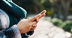 Park, student and hands with smartphone, texting or communication for upcoming test on social media. Outdoor, space and person with mobile for chat, typing and updates of exam schedule and online