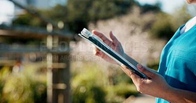 Buy stock photo Nurse, woman or hand with tablet in garden for check, monitor patient activity or record note. Caregiver, digital report or person in care facility with tech, medical aid or observation for update