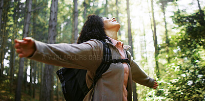 Buy stock photo Freedom, nature and woman in forest with open arms, peaceful mood and outdoor in hiking adventure. Achievement, relax and hiker in woods with stretch, fresh air and travel on trekking journey.