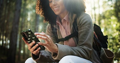 Buy stock photo Hiking, hands and woman with phone in forest for location search, check map and travel adventure. Trekking break, hiker and happy with smartphone in nature for online navigation, direction or texting