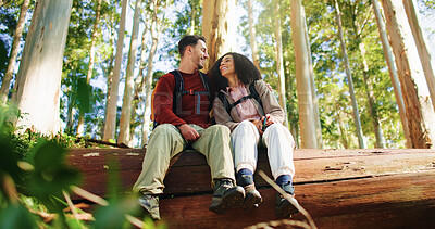 Buy stock photo Hug, hikers and couple in nature, laugh and break on adventure, forest and relax on holiday or love. Outdoor, man and embrace with woman in woods, backpacker or romance on vacation and low angle
