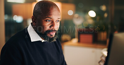 Buy stock photo Night, business and black man in office with desktop, bokeh and review on company metric. Productivity, corporate and operation analyst in workplace with tech, strategy or feedback report for KPI.