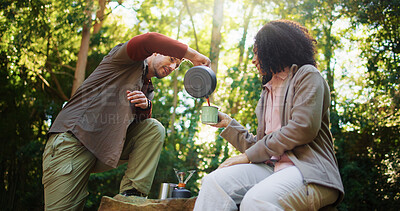 Buy stock photo Camping, kettle and coffee with couple in nature for travel destination, pouring and boiling water. Bonding, brewing tea and gas stove with man and woman in forest for trekking adventure and vacation